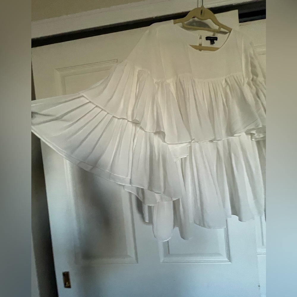 White with dramatic sleeves